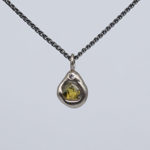 Green rough diamond sculptural pendant in white gold and sterling silver by Tamara Gomez 1