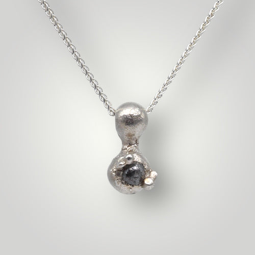 Rough diamond infinity pendant in sterling silver by Tamara Gomez 1