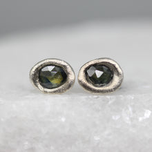 Load image into Gallery viewer, Handmade silver stud earrings with molten-set green sapphires