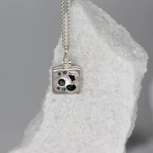 Sapphire and diamond square composition pendant necklace in sterling silver by Tamara Gomez