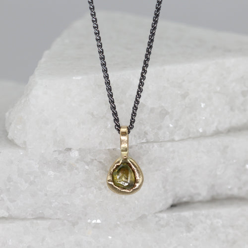 Rough diamond pendant necklace in yellow gold and blackened silver chain by Tamara Gomez