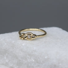 Load image into Gallery viewer, Organic yellow gold moissanite ring showing hand formed twist detail.