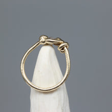 Load image into Gallery viewer, Organic yellow gold moissanite ring showing hand formed twist detail