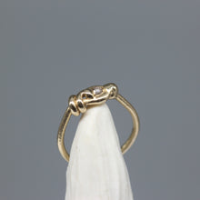Load image into Gallery viewer, Organic yellow gold moissanite ring showing hand formed twist detail