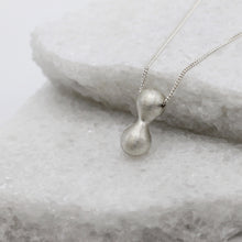 Load image into Gallery viewer, Large infinity pendant necklace in sterling silver by Tamara Gomez