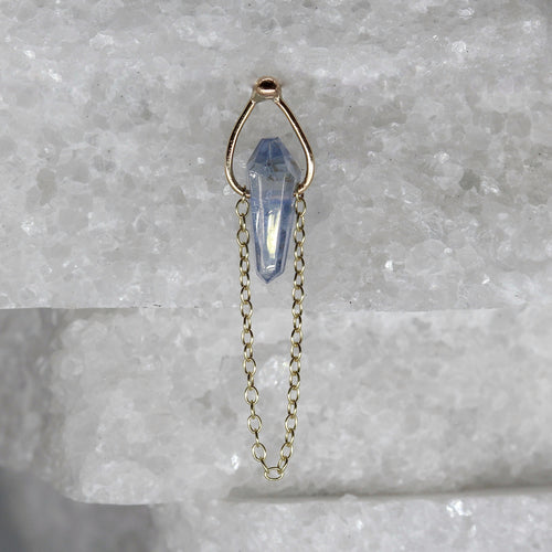 Single blue sapphire crystal earring in yellow gold by Tamara Gomez	
