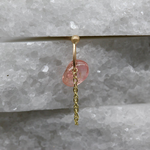 Single padparadscha sapphire earring in yellow gold with chain detail by Tamara Gomez