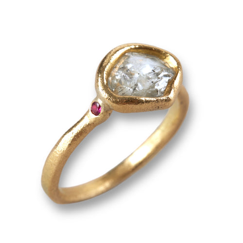Rough diamond and ruby ring in yellow gold
