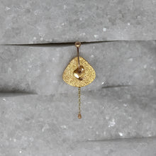 Load image into Gallery viewer, Single diamond slice stud earring in yellow gold with chain by Tamara Gomez