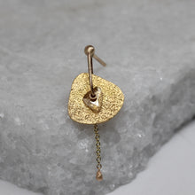 Load image into Gallery viewer, Single diamond slice stud earring in yellow gold with chain by Tamara Gomez