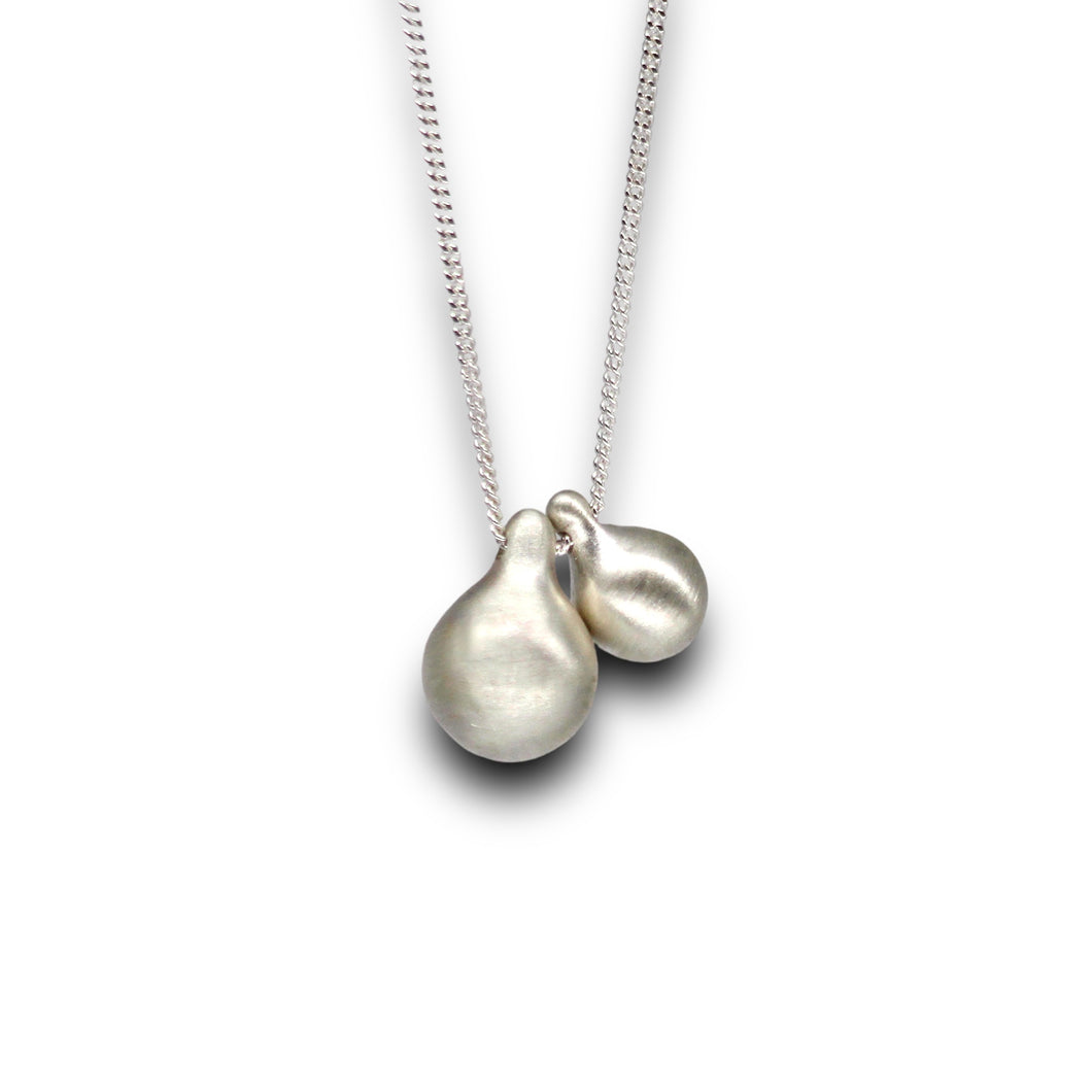 Double teardrop pendant necklace in sterling silver by Tamara Gomez