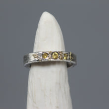 Load image into Gallery viewer, Textured silver band with three bright yellow sapphires and sculptural detailing