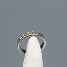 Load image into Gallery viewer, Side view of yellow sapphire three stone ring in sterling silver