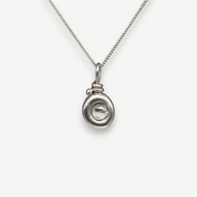 Load image into Gallery viewer, Rough diamond lozenge necklace in sterling silver set with a 0.40 carat natural grey rough diamond, handcrafted in London by Tamara Gomez.