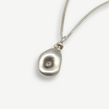 Load image into Gallery viewer, Rough diamond talisman pendant in sterling silver set with a 0.40 carat natural grey rough diamond, handcrafted in London by Tamara Gomez.
