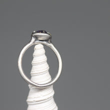 Load image into Gallery viewer, Purple sapphire ring in sterling silver with flecks of 18ct gold, featuring a hand cut Sri Lankan sapphire, handcrafted in London by Tamara Gomez.