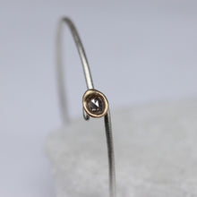 Load image into Gallery viewer, Sterling silver oval bangle with molten set rose cut diamond in 14ct yellow gold, handcrafted by Tamara Gomez.