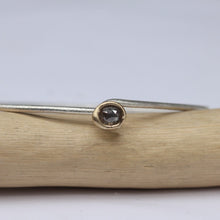 Load image into Gallery viewer, Sterling silver oval bangle with molten set rose cut diamond in 14ct yellow gold, handcrafted by Tamara Gomez.