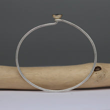 Load image into Gallery viewer, Sterling silver oval bangle with molten set rose cut diamond in 14ct yellow gold, handcrafted by Tamara Gomez.