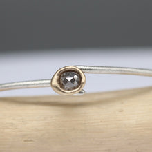 Load image into Gallery viewer, Sterling silver oval bangle with molten set rose cut diamond in 14ct yellow gold, handcrafted by Tamara Gomez.