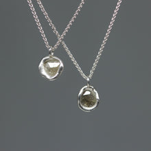 Load image into Gallery viewer, Molten-set rose cut diamond pendant necklaces in sterling silver on Byzantine chains, featuring one-carat pale grey diamonds, handcrafted in London by Tamara Gomez.