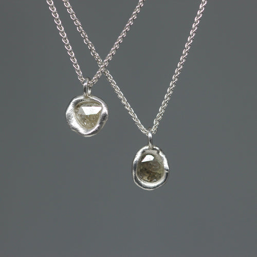Molten-set rose cut diamond pendant necklaces in sterling silver on Byzantine chains, featuring one-carat pale grey diamonds, handcrafted in London by Tamara Gomez.