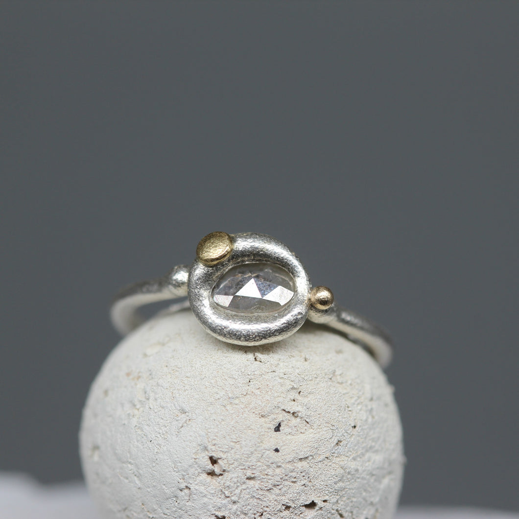 Rose cut diamond ring in molten sterling silver with 18ct yellow gold details, handcrafted in London by Tamara Gomez.
