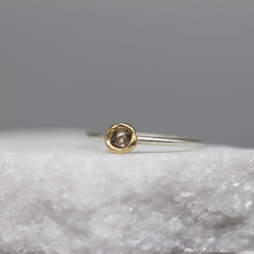 Classic rough diamond bud ring in 18ct yellow gold and sterling silver with 0.25ct rough diamond, handcrafted in London by Tamara Gomez.

