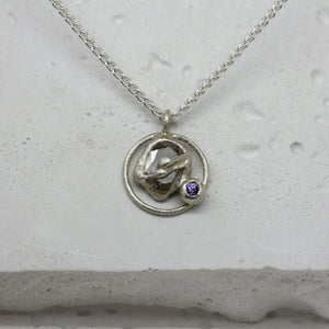 Rose cut diamond necklace in silver and violet sapphire