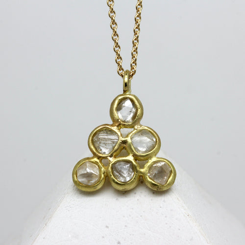 Rough diamond triangle pendant necklace in 18ct yellow gold.