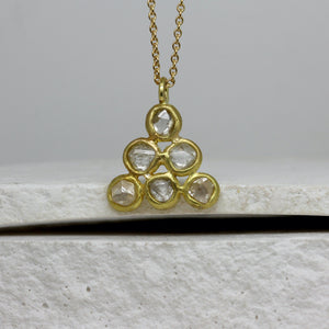 Rough diamond triangle pendant necklace in 18ct yellow gold.