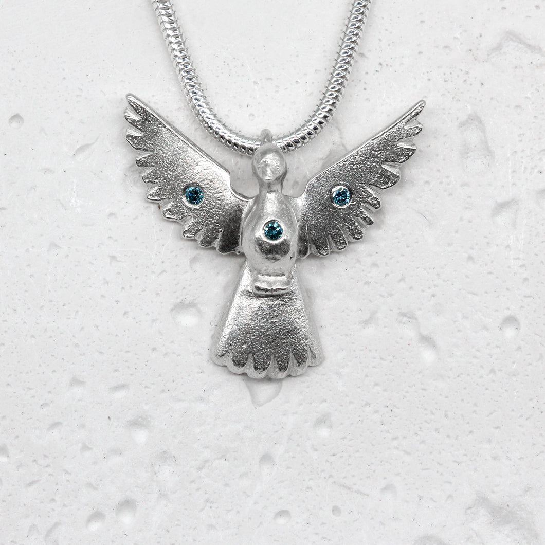 Dove pendant in Sterling Silver with blue diamonds